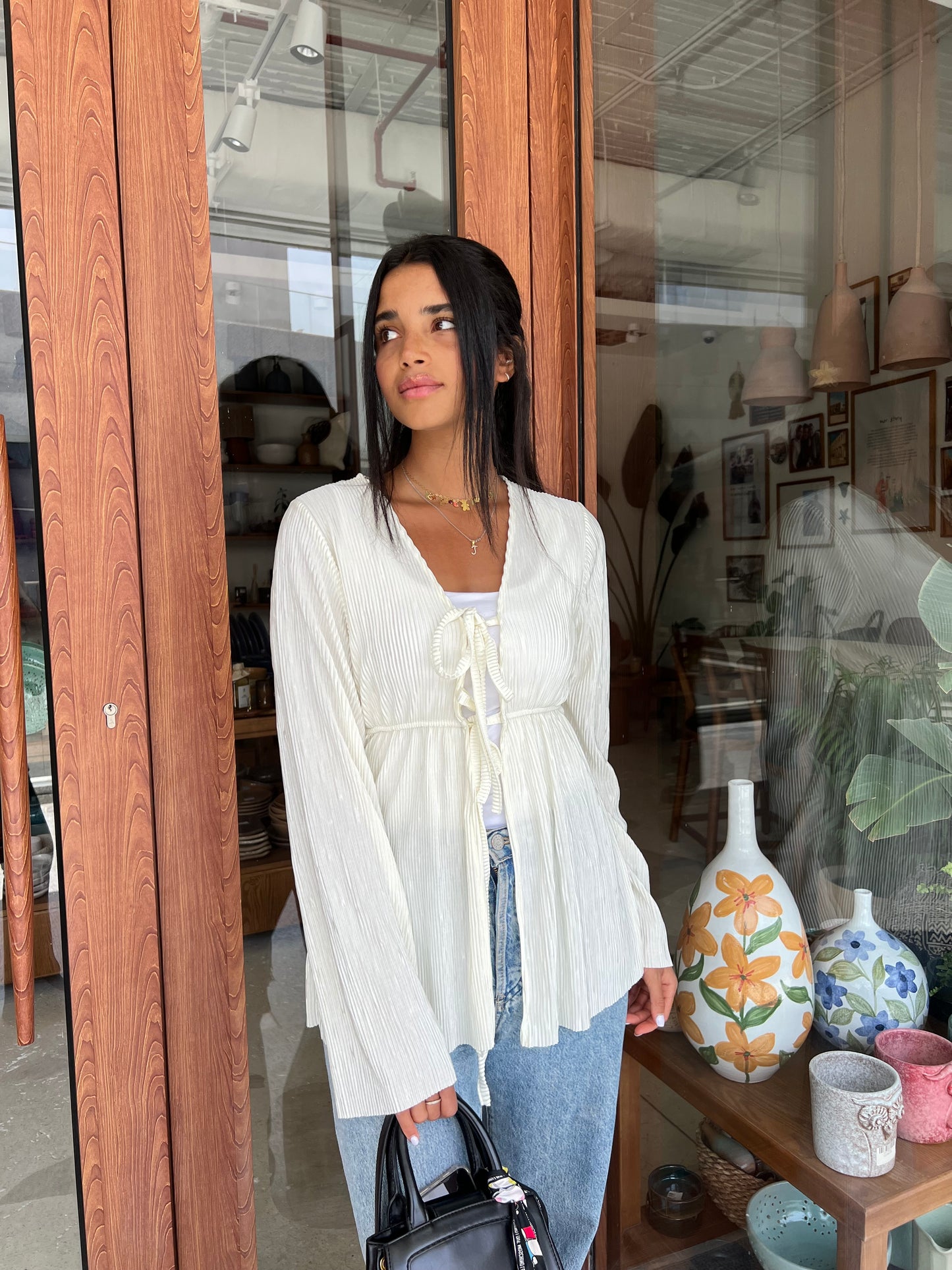 Plissé knot cream top